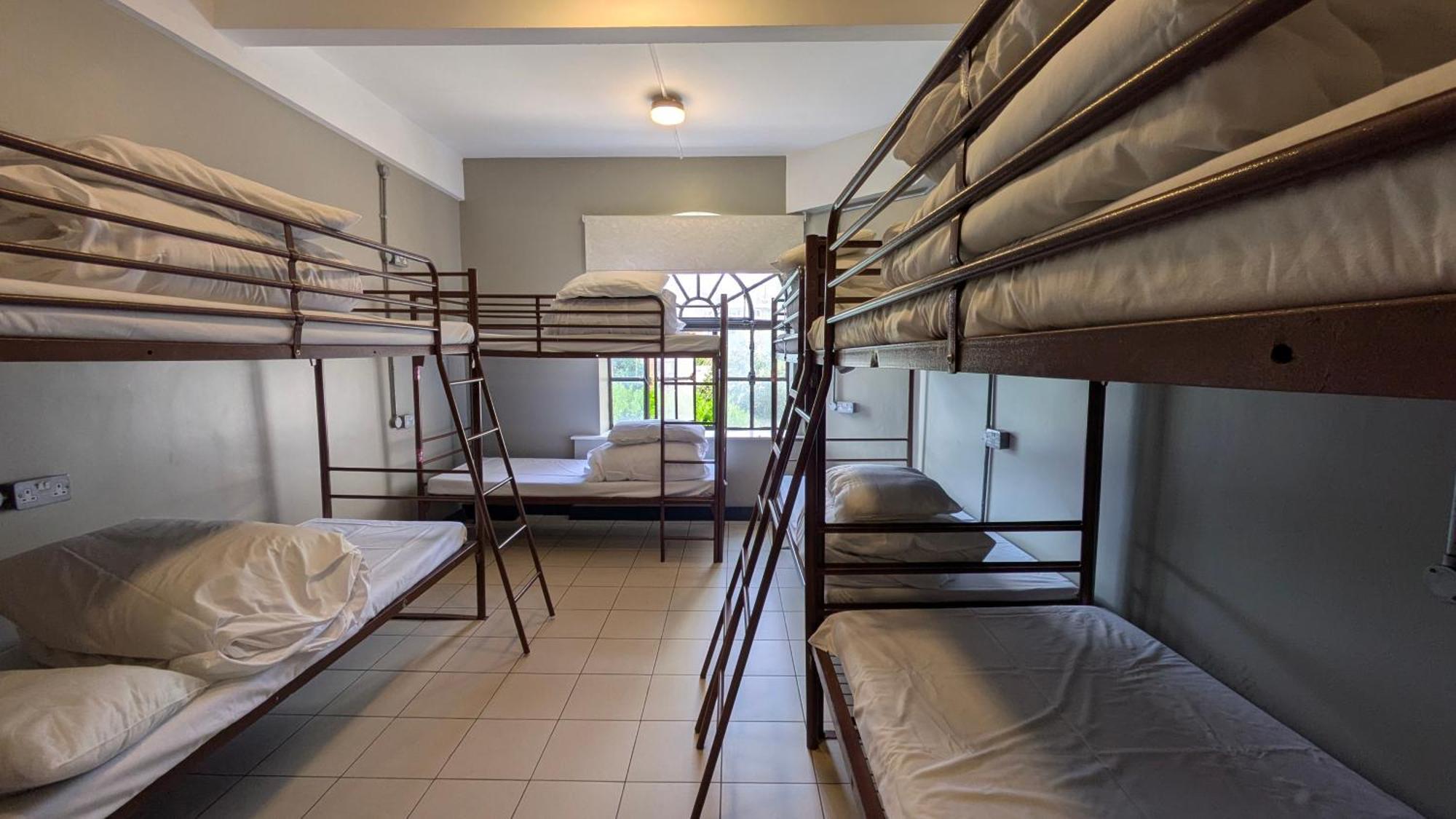 Posto Letto in Camera Mista con 8 Letti e Bagno in Comune