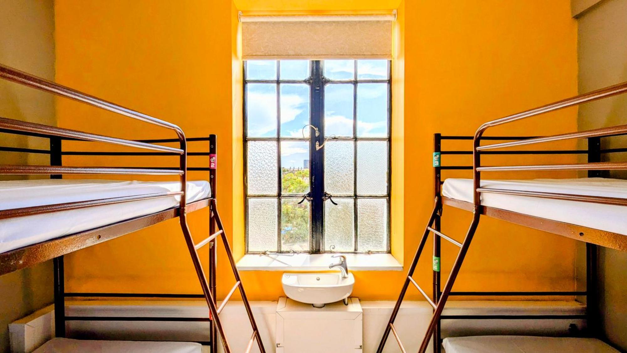Posto Letto in Camera Mista con 4 Letti e Bagno in Comune